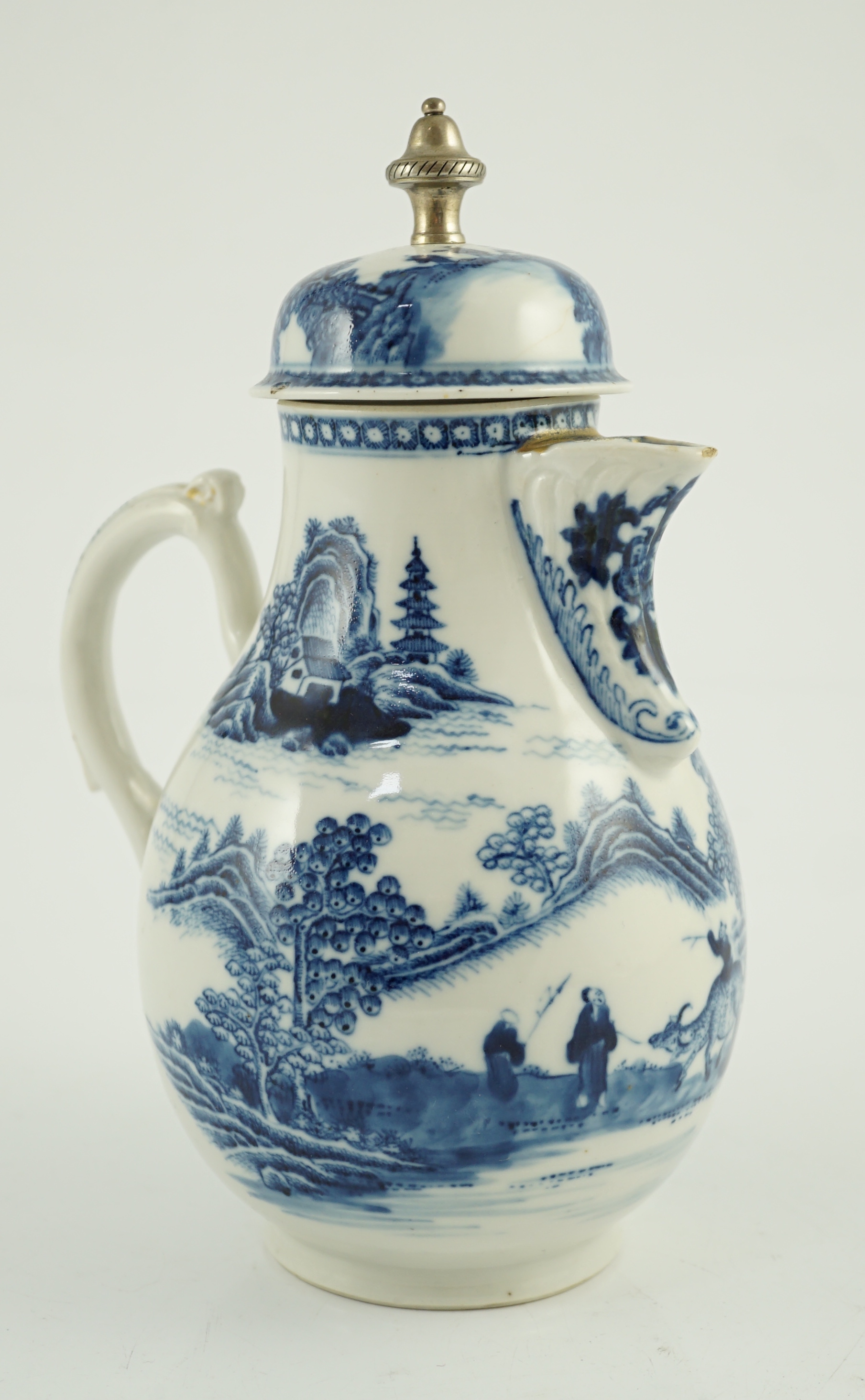 A Chinese blue and white jug and cover, Qianlong period, later metal finial